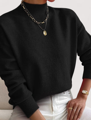 Women's relaxed crew neck long sleeve sweater with ribbed cuffs and hemline