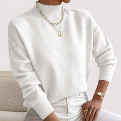 Women's relaxed crew neck long sleeve sweater with ribbed cuffs and hemline