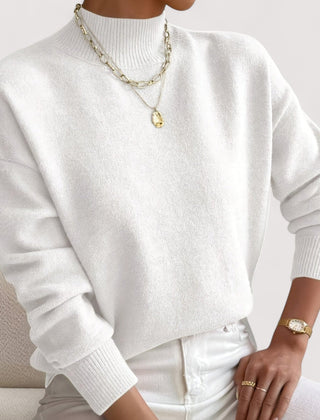 Women's relaxed crew neck long sleeve sweater with ribbed cuffs and hemline
