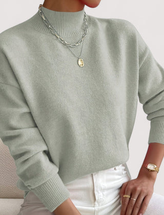 Women's relaxed crew neck long sleeve sweater with ribbed cuffs and hemline