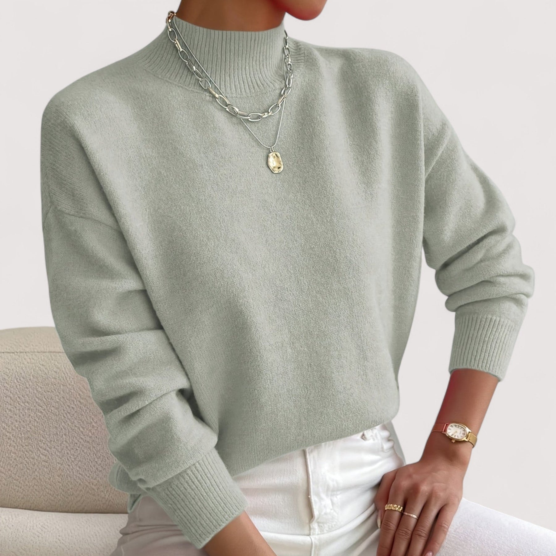 Women's relaxed crew neck long sleeve sweater with ribbed cuffs and hemline
