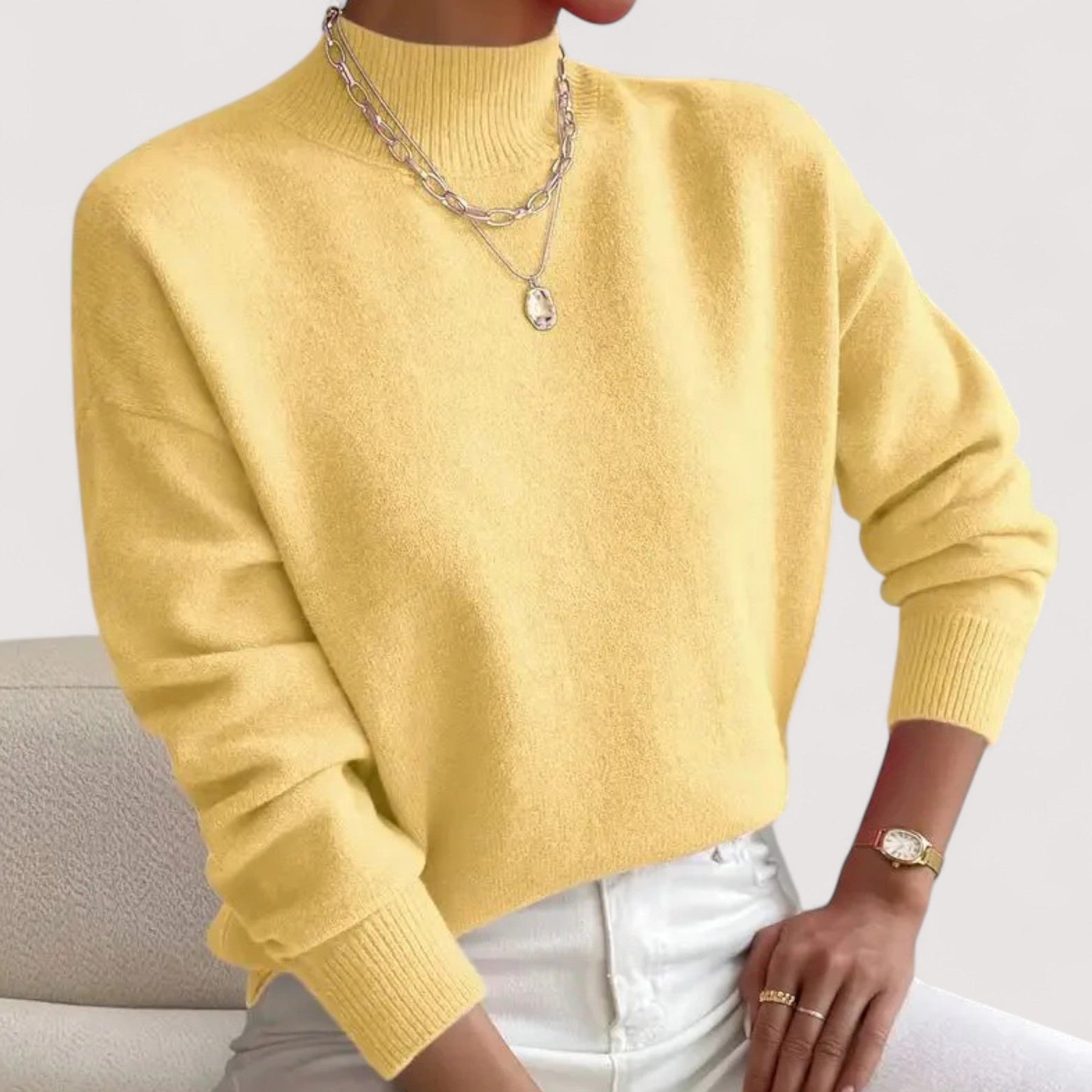 Women's relaxed crew neck long sleeve sweater with ribbed cuffs and hemline