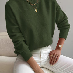 Women's crew neck sweater with ribbed cuffs and hemline in a solid shade