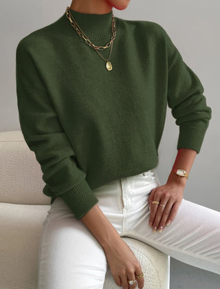 Women's crew neck sweater with ribbed cuffs and hemline in a solid shade
