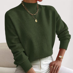 Women's relaxed crew neck long sleeve sweater with ribbed cuffs and hemline