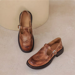 Women's leather T-strap Mary Jane brogue shoes with low block heel in brown and black