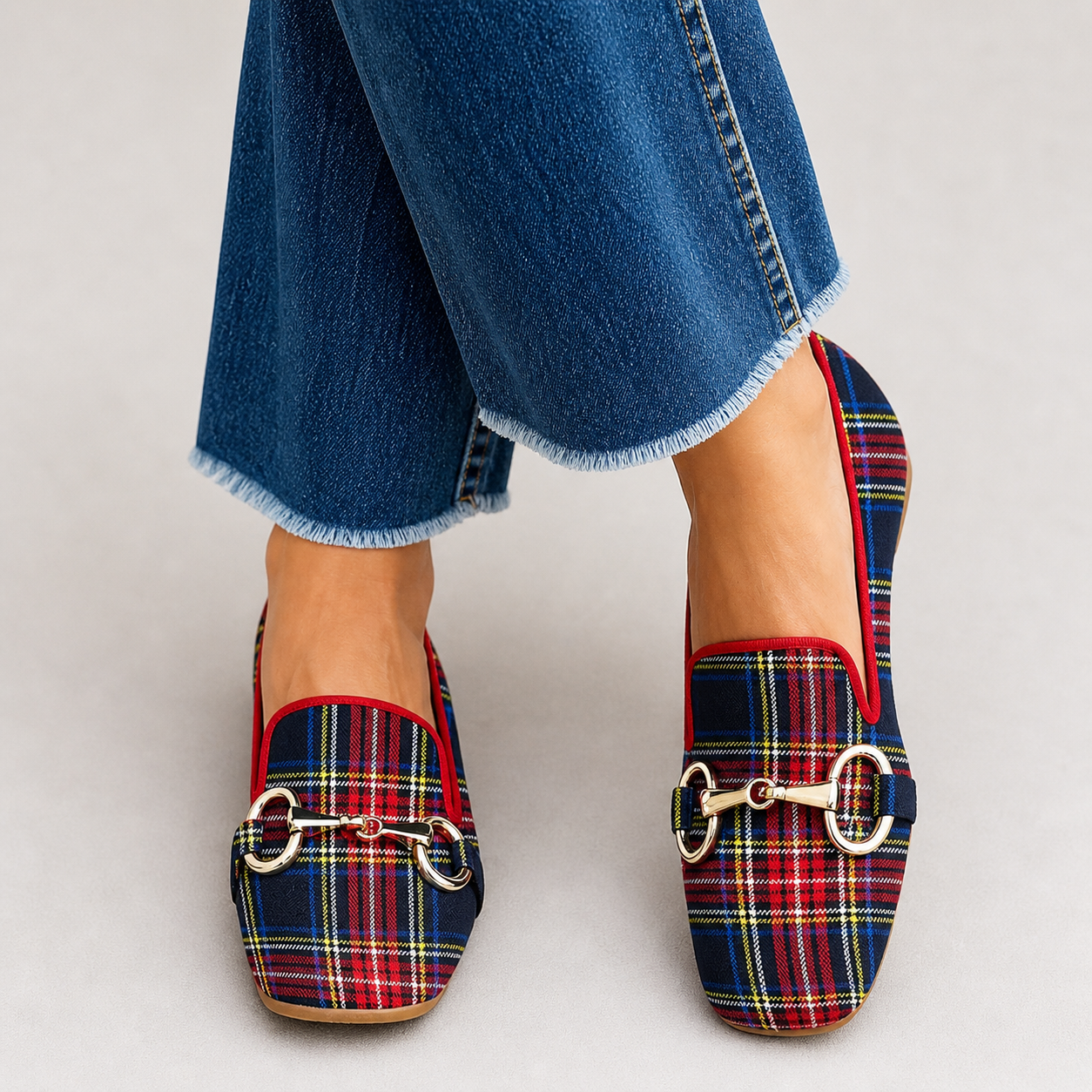 Women's check-pattern loafers with refined detailing and slip-on design
