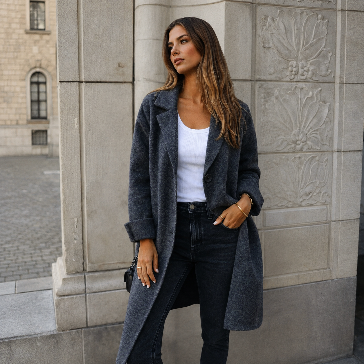 Melanie classic button coat with collar and pockets in a relaxed fit, shown for women