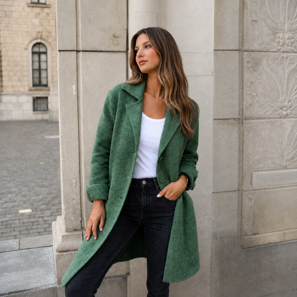 Melanie classic button coat with collar and pockets in a relaxed fit, shown for women