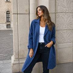 Melanie classic button coat with collar and pockets in a relaxed fit, shown for women
