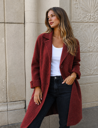 Melanie classic button coat with collar and pockets in a relaxed fit, shown for women