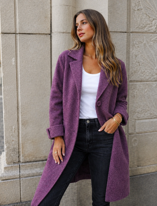 Melanie classic button coat with collar and pockets in a relaxed fit, shown for women