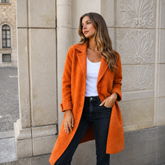 Melanie classic button coat with collar and pockets in a relaxed fit, shown for women