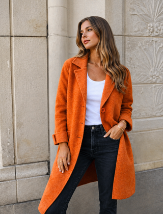 Melanie classic button coat with collar and pockets in a relaxed fit, shown for women