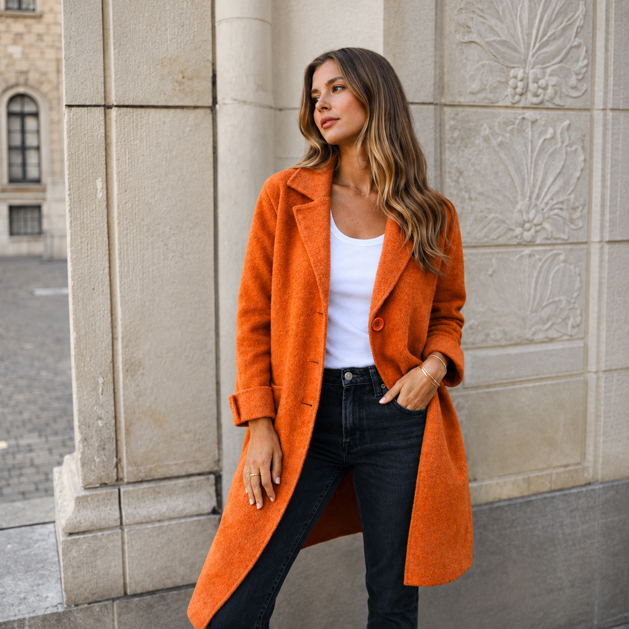 Melanie classic button coat with collar and pockets in a relaxed fit, shown for women