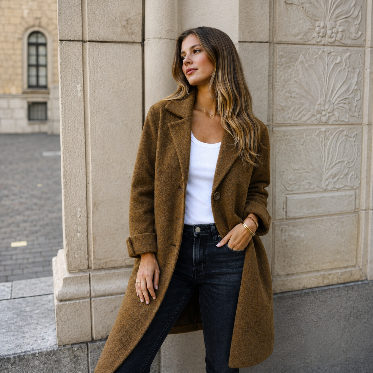 Melanie classic button coat with collar and pockets in a relaxed fit, shown for women