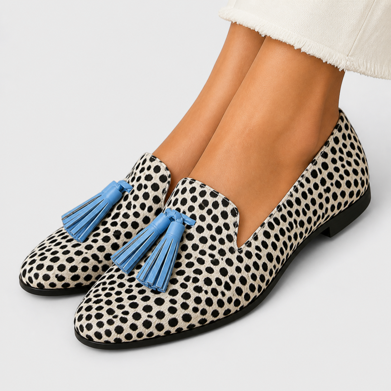 Women's slip-on loafers with long fringe tassel detail