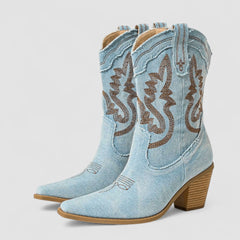 Embroidered western cowboy boots in faded blue with scrollwork shaft, pointed toe and block heel