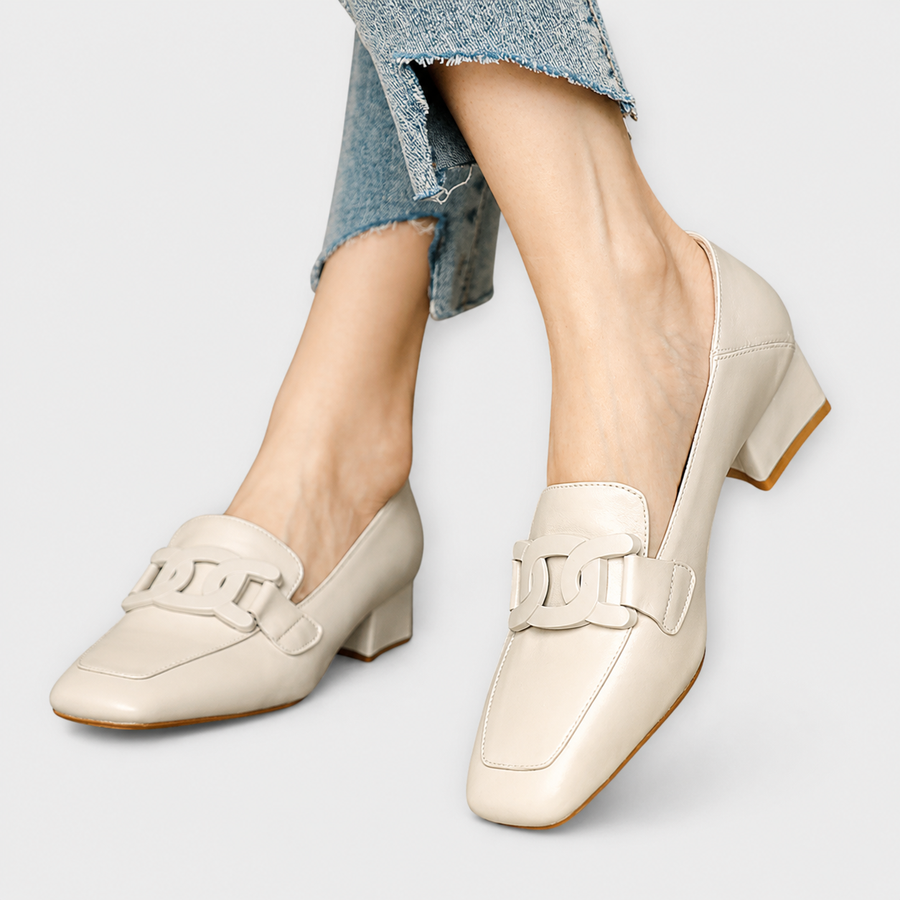 Comfortable slip-on loafers shown in beige, brown and black