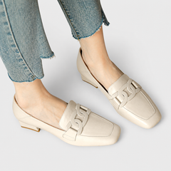 Comfortable slip-on loafers shown in beige, brown and black