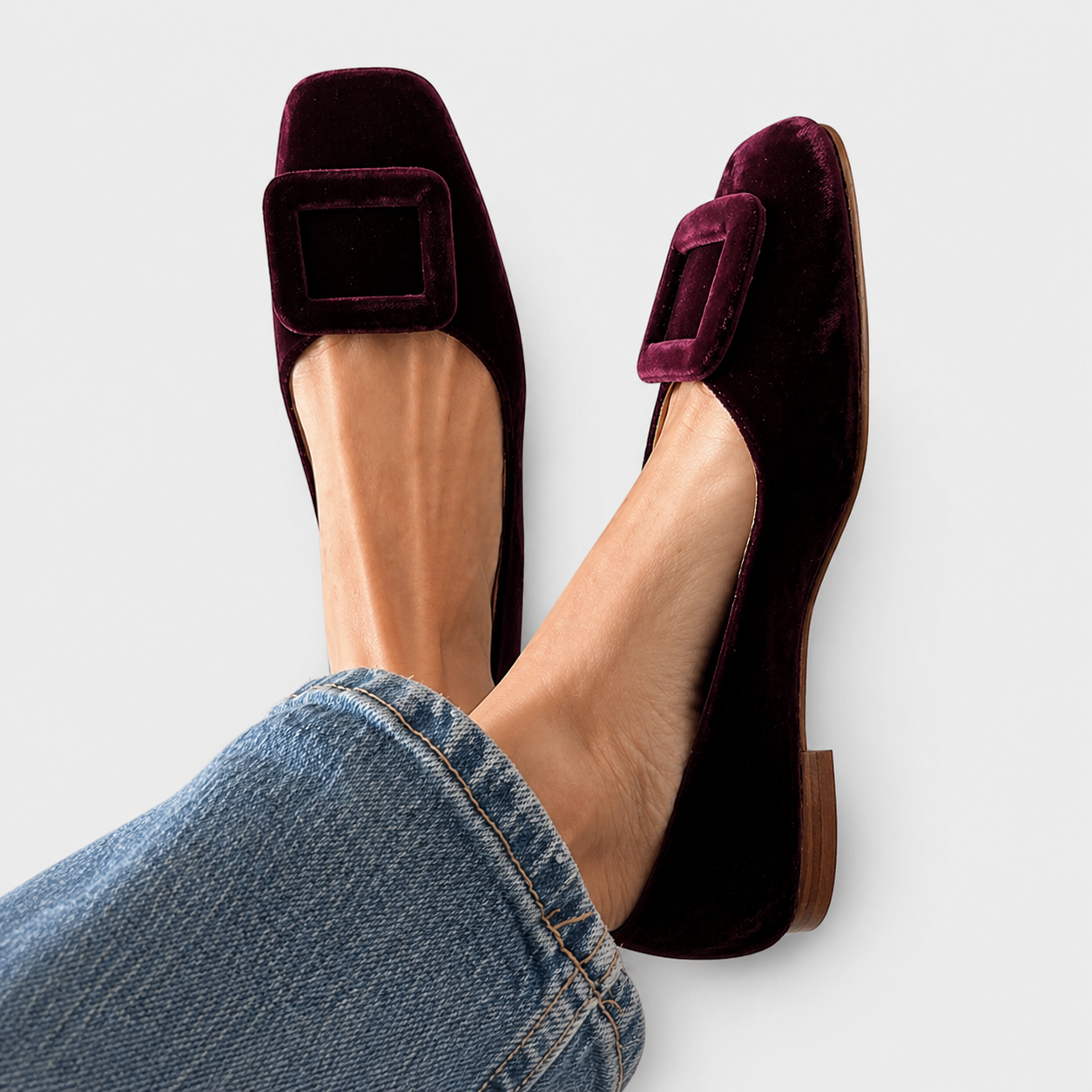 Women's embossed loafers shown in bordeaux and green colourways