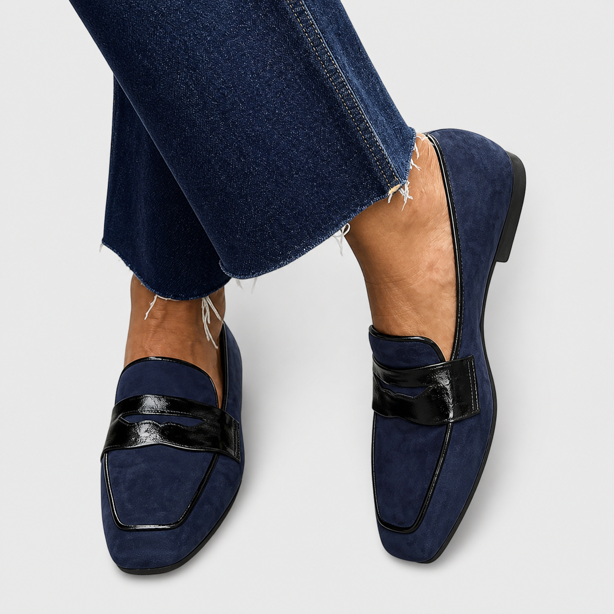Chic blue slip-on loafers with refined structured detailing
