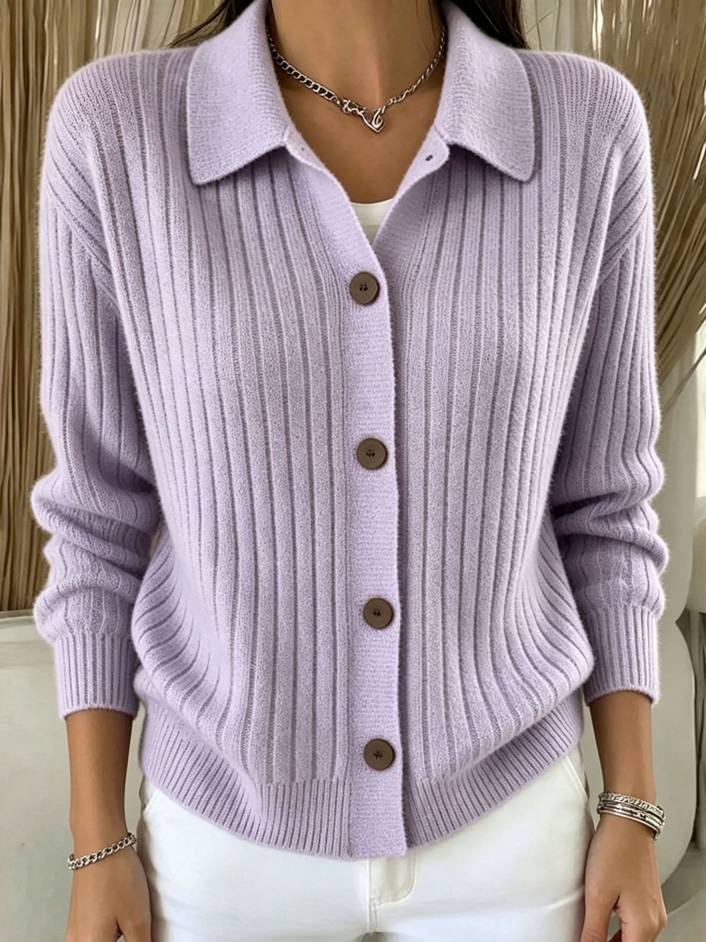 Blue ribbed collared button-down cardigan sweater with a relaxed fit