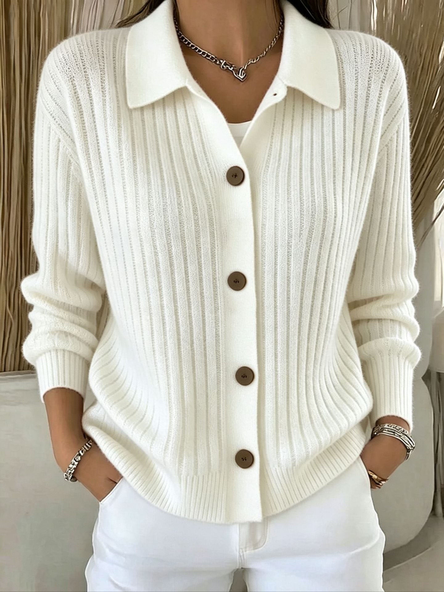 Blue ribbed collared button-down cardigan sweater with a relaxed fit