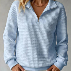 Women's waffle knit stand collar long sleeve pullover sweater in a relaxed fit