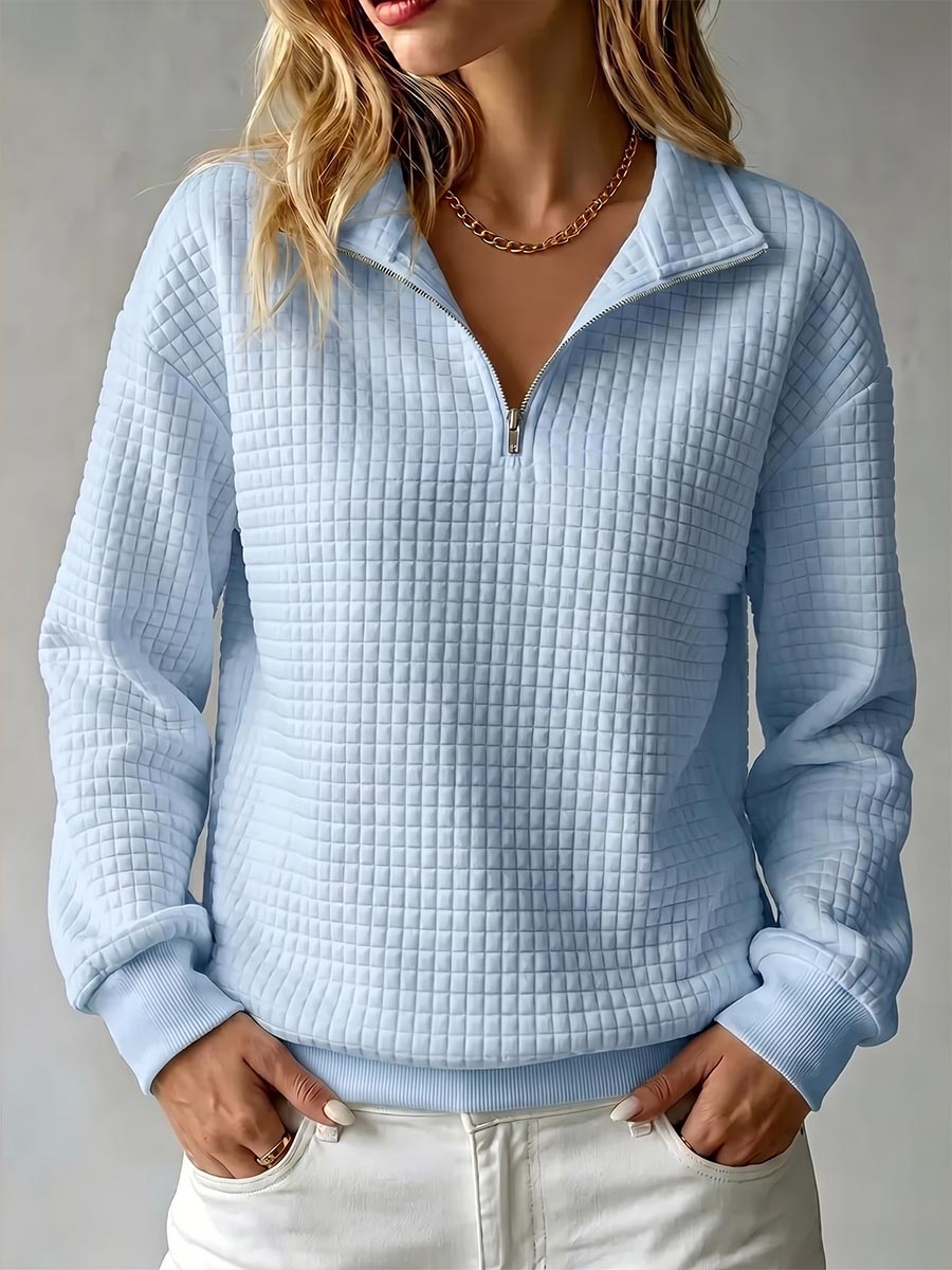 Women's waffle knit stand collar long sleeve pullover sweater in a relaxed fit