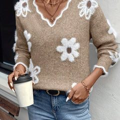 Floral knit sweater with scalloped V-neckline and relaxed fit in five colourways