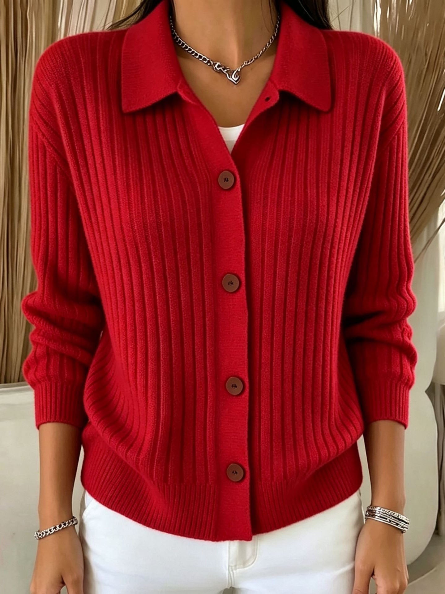 Blue ribbed collared button-down cardigan sweater with a relaxed fit