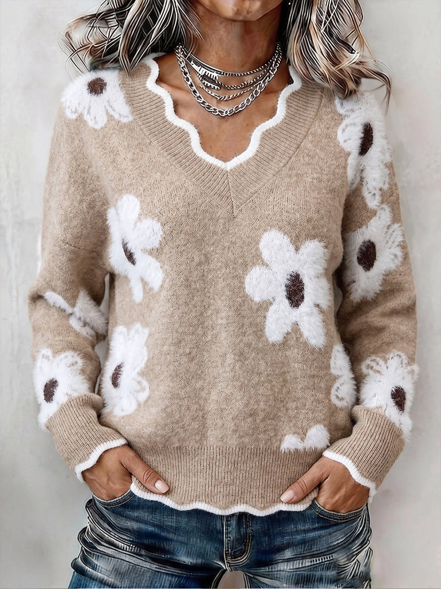 Floral knit sweater with scalloped V-neckline and relaxed fit in five colourways
