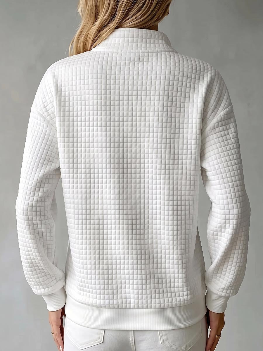 Women's waffle knit stand collar long sleeve pullover sweater in a relaxed fit