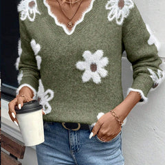 Floral knit sweater with scalloped V-neckline and relaxed fit in five colourways