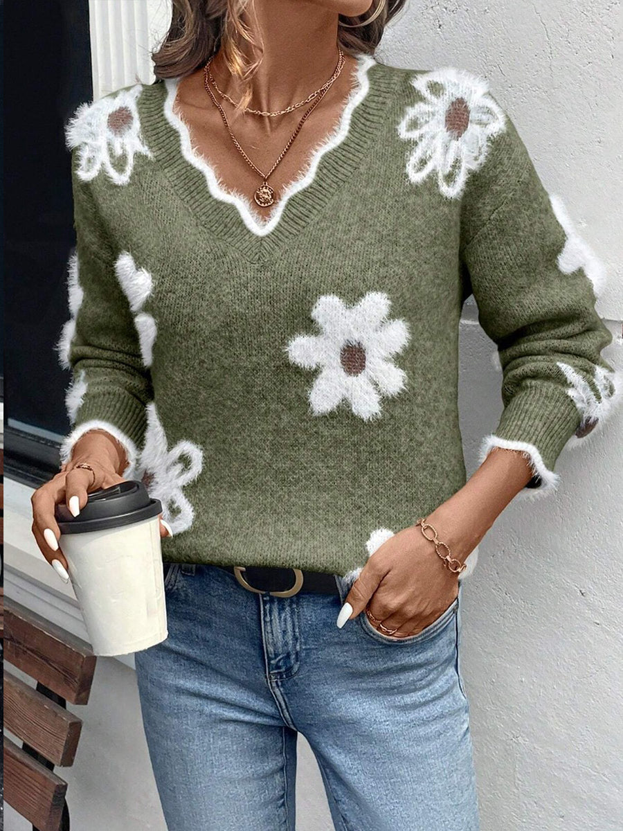 Floral knit sweater with scalloped V-neckline and relaxed fit in five colourways