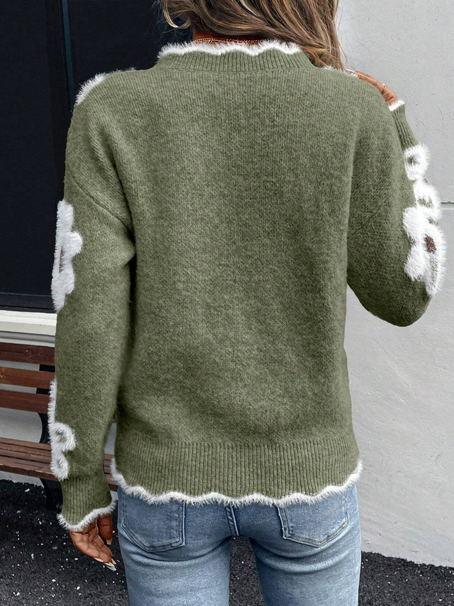 Floral knit sweater with scalloped V-neckline and relaxed fit in five colourways