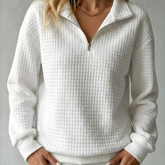 Women's waffle knit stand collar long sleeve pullover sweater in a relaxed fit