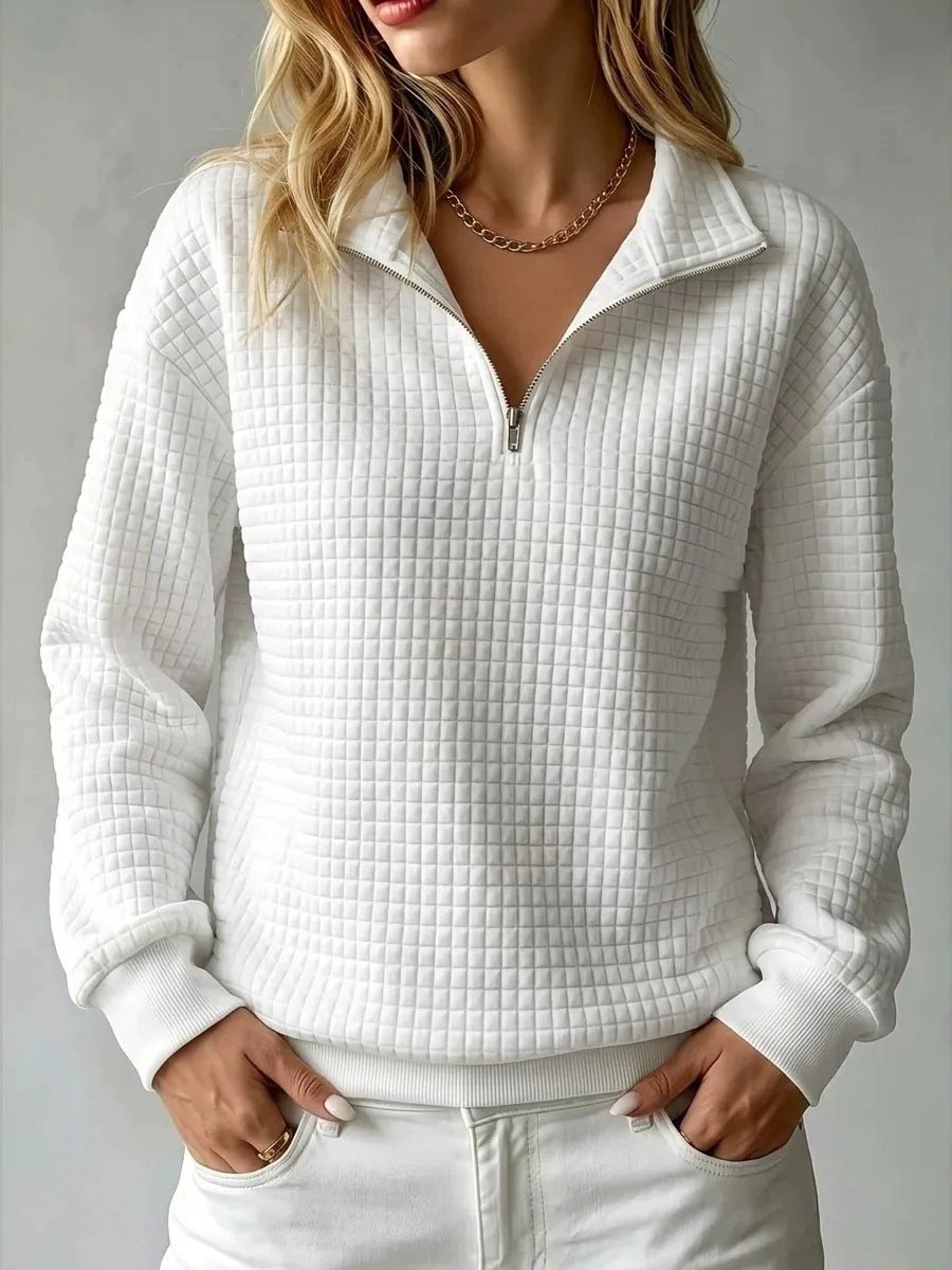 Women's waffle knit stand collar long sleeve pullover sweater in a relaxed fit