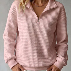 Women's waffle knit stand collar long sleeve pullover sweater in a relaxed fit