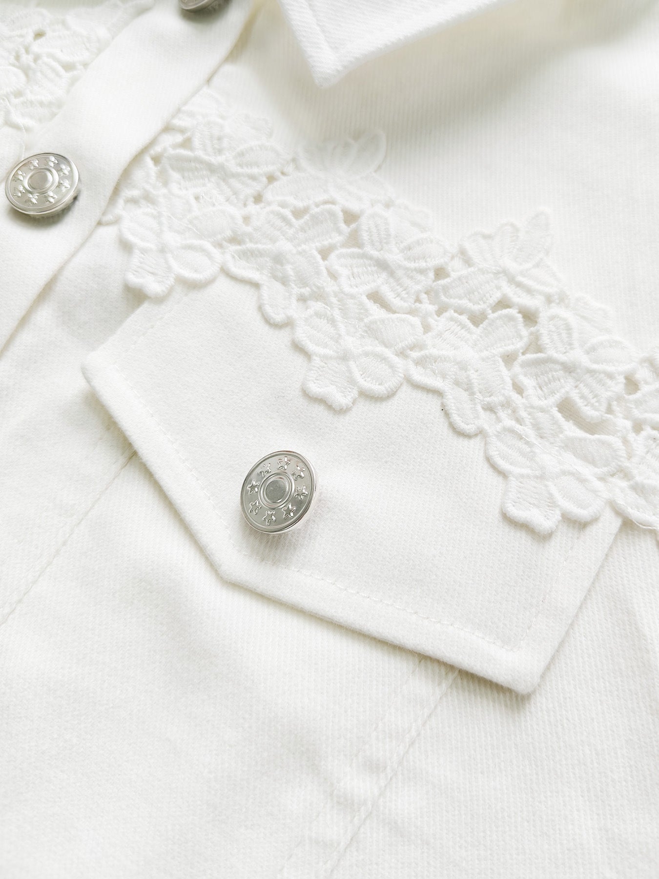 White lace-panel jacket with floral trim, sheer tulle hem and three-quarter flared sleeves