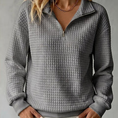 Women's waffle knit stand collar long sleeve pullover sweater in a relaxed fit