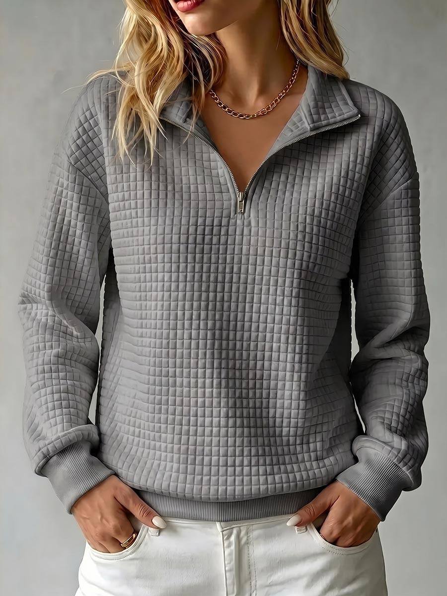 Women's waffle knit stand collar long sleeve pullover sweater in a relaxed fit