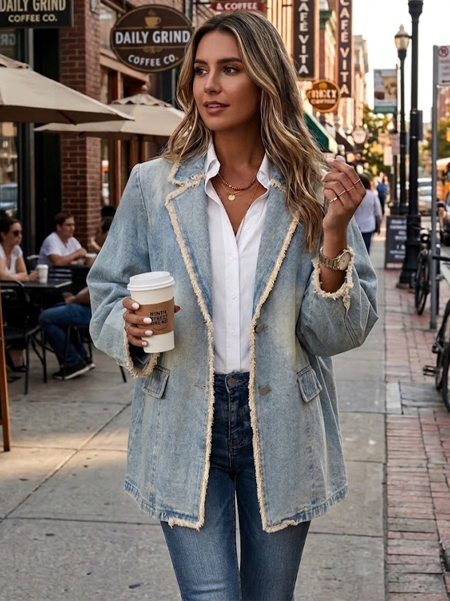 Light wash blue oversized blazer with raw edges, notched lapel and flap patch pockets