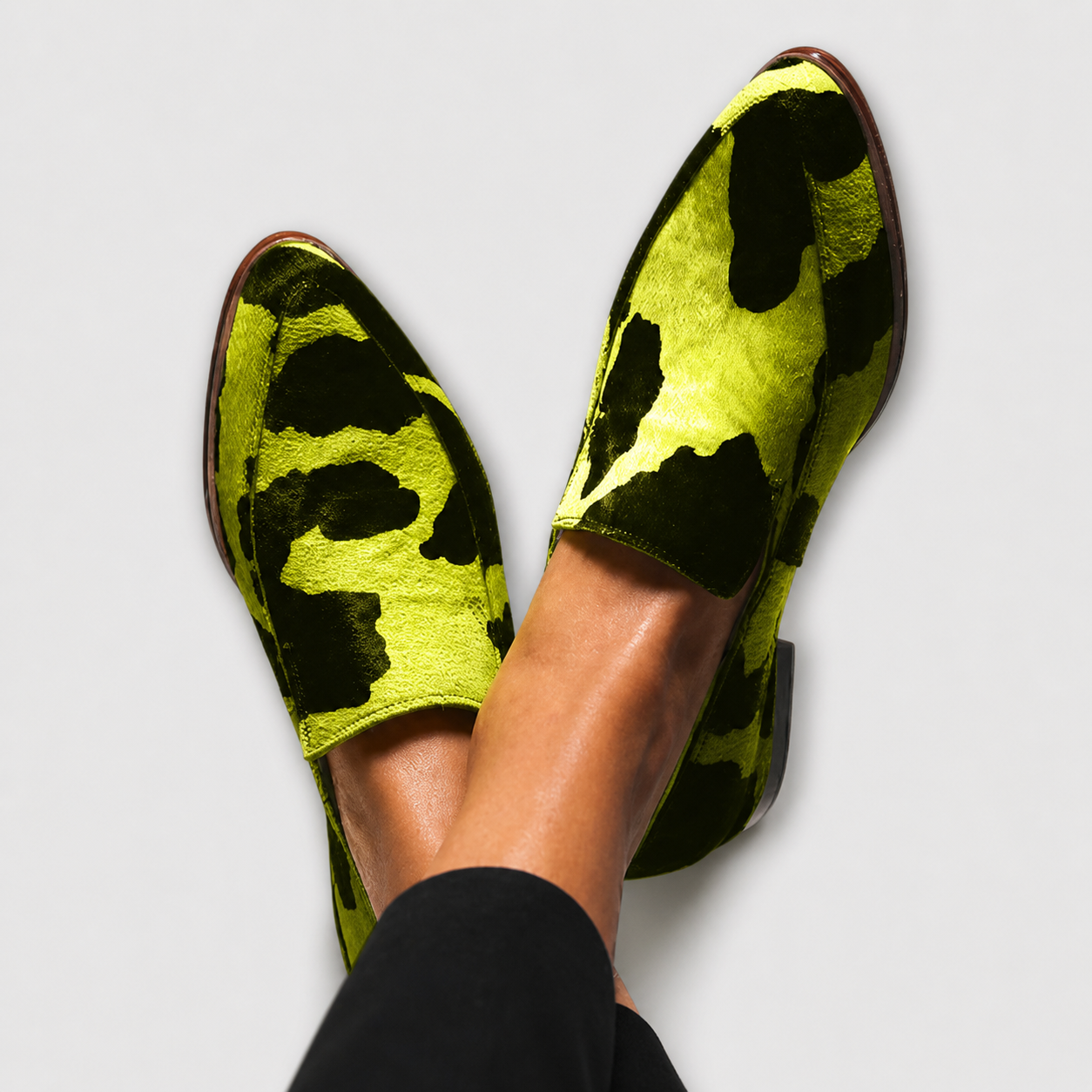 Paloma cow print loafers for women in pink and green colourways