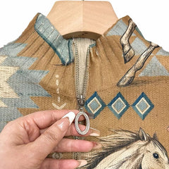 Zip cardigan with cream horses and sage cactus Southwestern print on a warm tan background