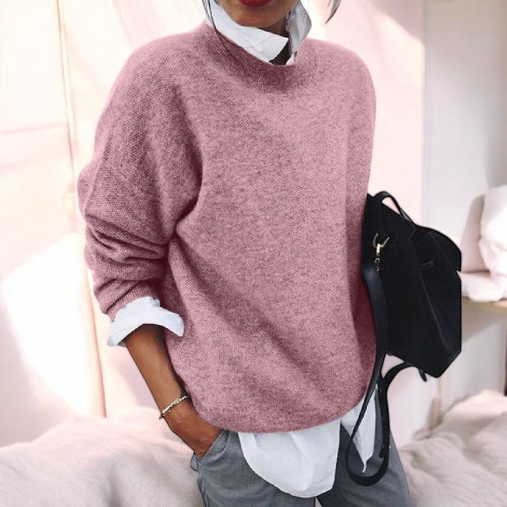 Women's solid single-tone round neck pullover sweater with long sleeves and straight hem