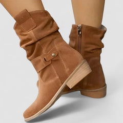 Slouch-style Western boots with low block heel, side zip and ankle buckle strap
