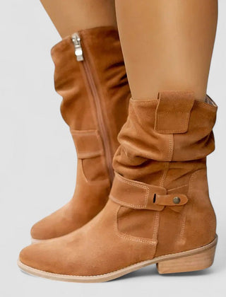 Slouch-style Western boots with low block heel, side zip and ankle buckle strap