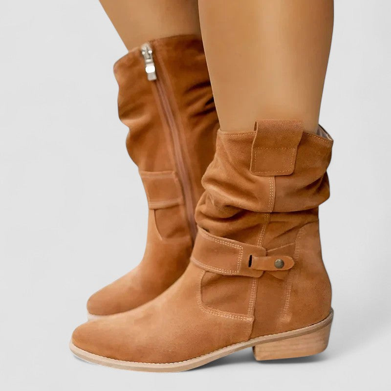Slouch-style Western boots with low block heel, side zip and ankle buckle strap